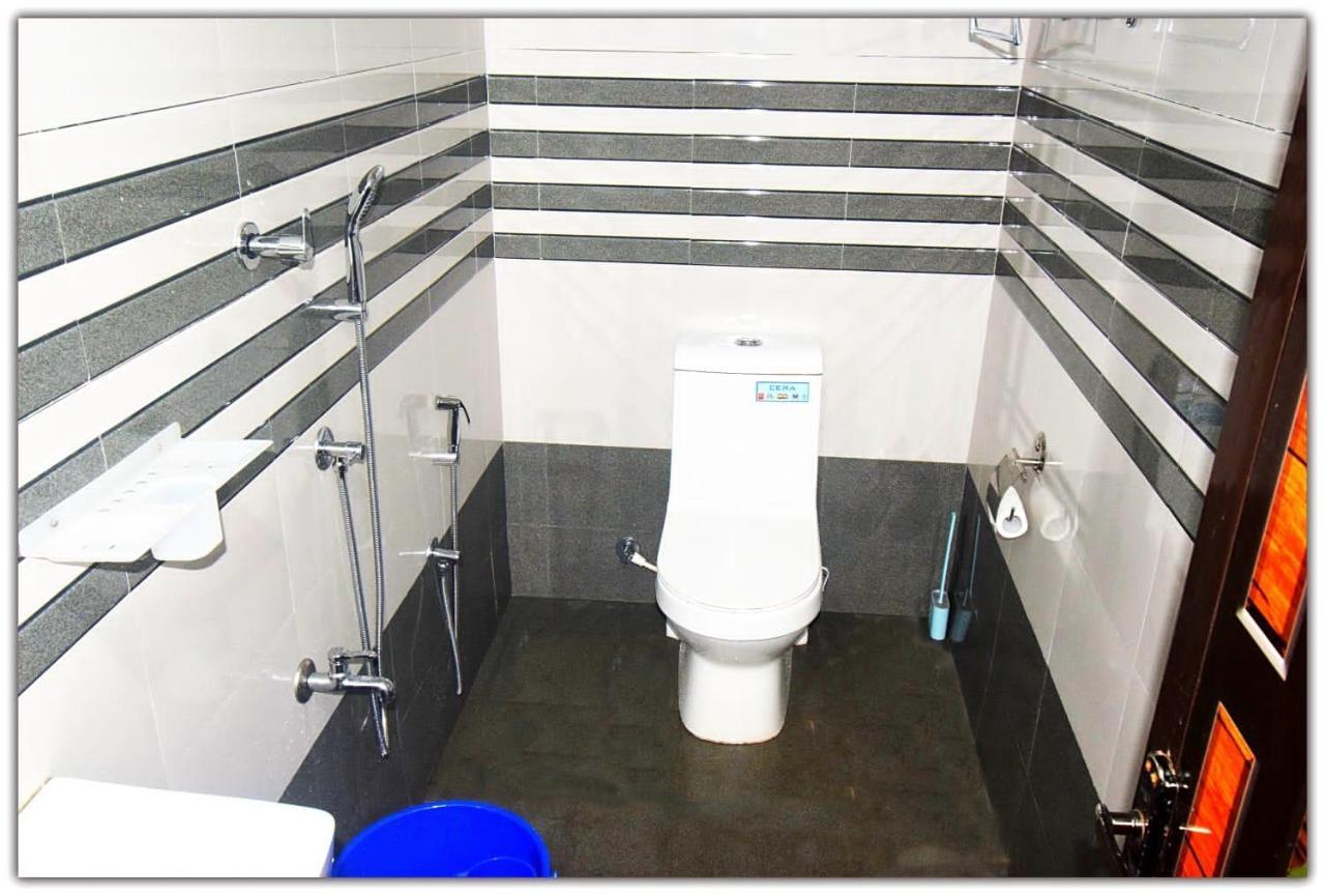 Munroe Inn Homestay Коллам Экстерьер фото